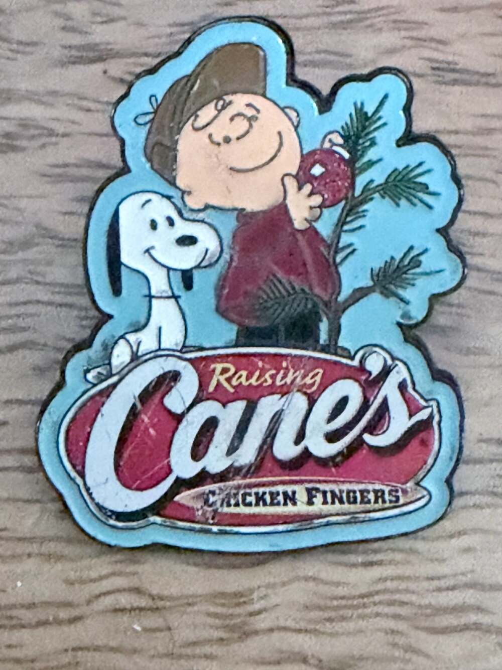 Raising Cane's Peanuts Snoopy and Charlie Brown 2021 Holiday Enamel Pin